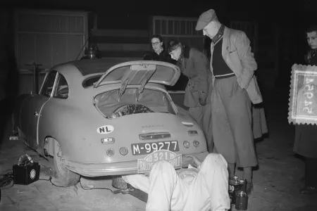 Mechanic fixing a rally car